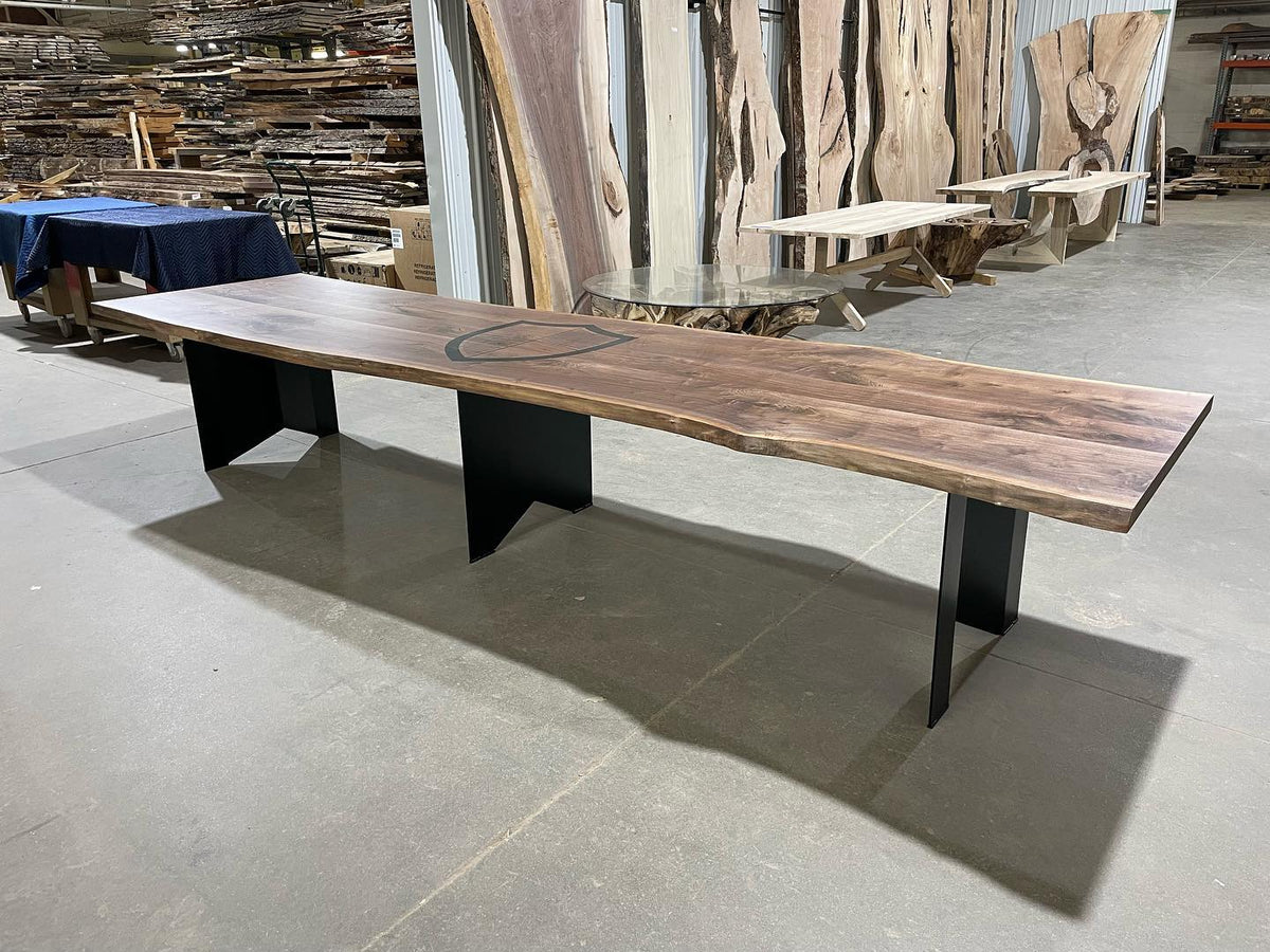 Live edge black walnut conference table with custom logo