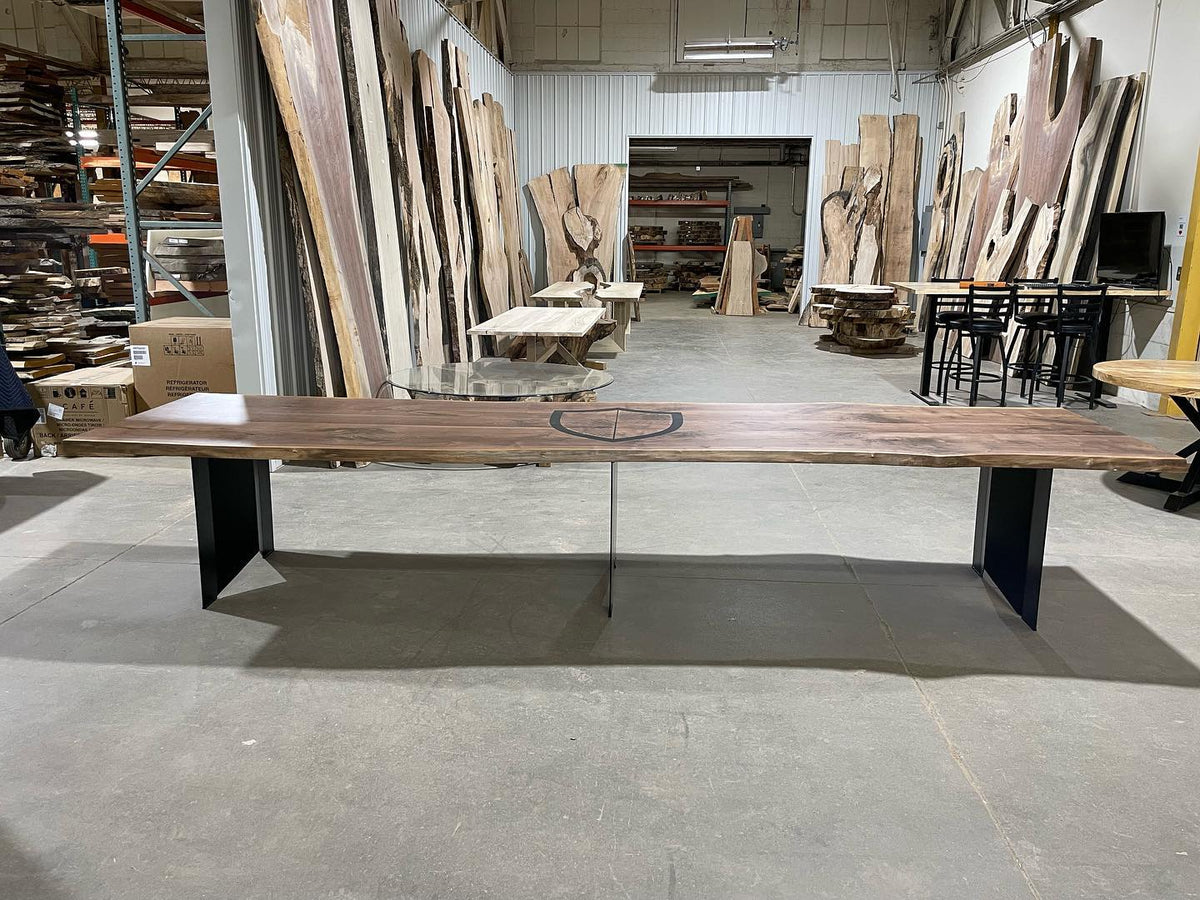 Live edge black walnut conference table with custom logo
