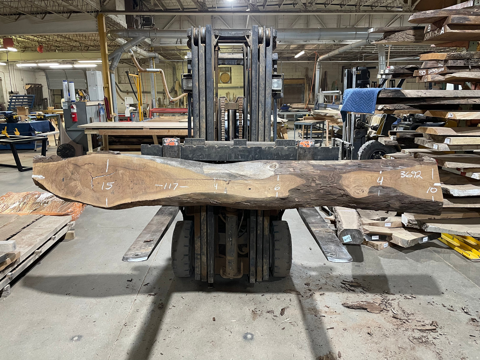 BLACK WALNUT (3692) 117” L x 4"-15” W x 2.5”