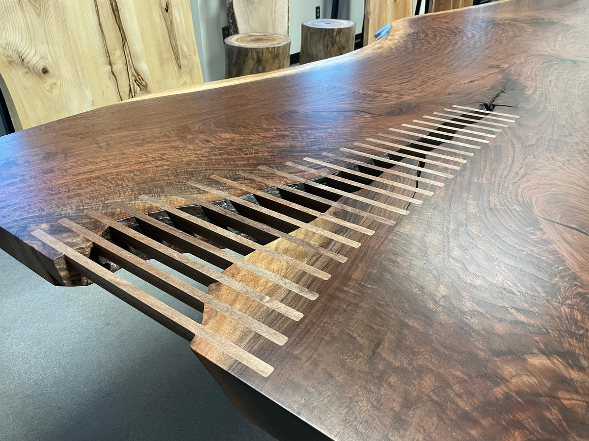 Live edge single slab black walnut table on custom steel base