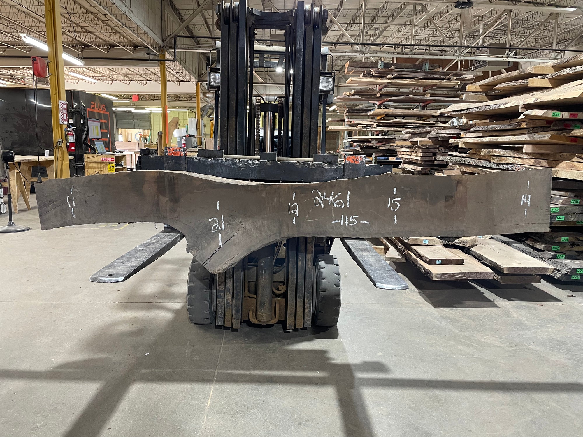 Curley Walnut (2461) 115” L x 11-21” W x 2.25” T