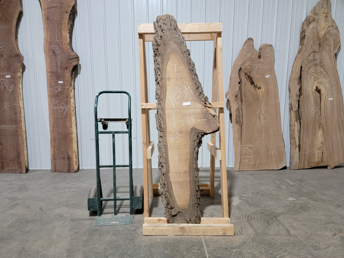 Black Walnut (1654) 63” L X 7-18” W X 2” T