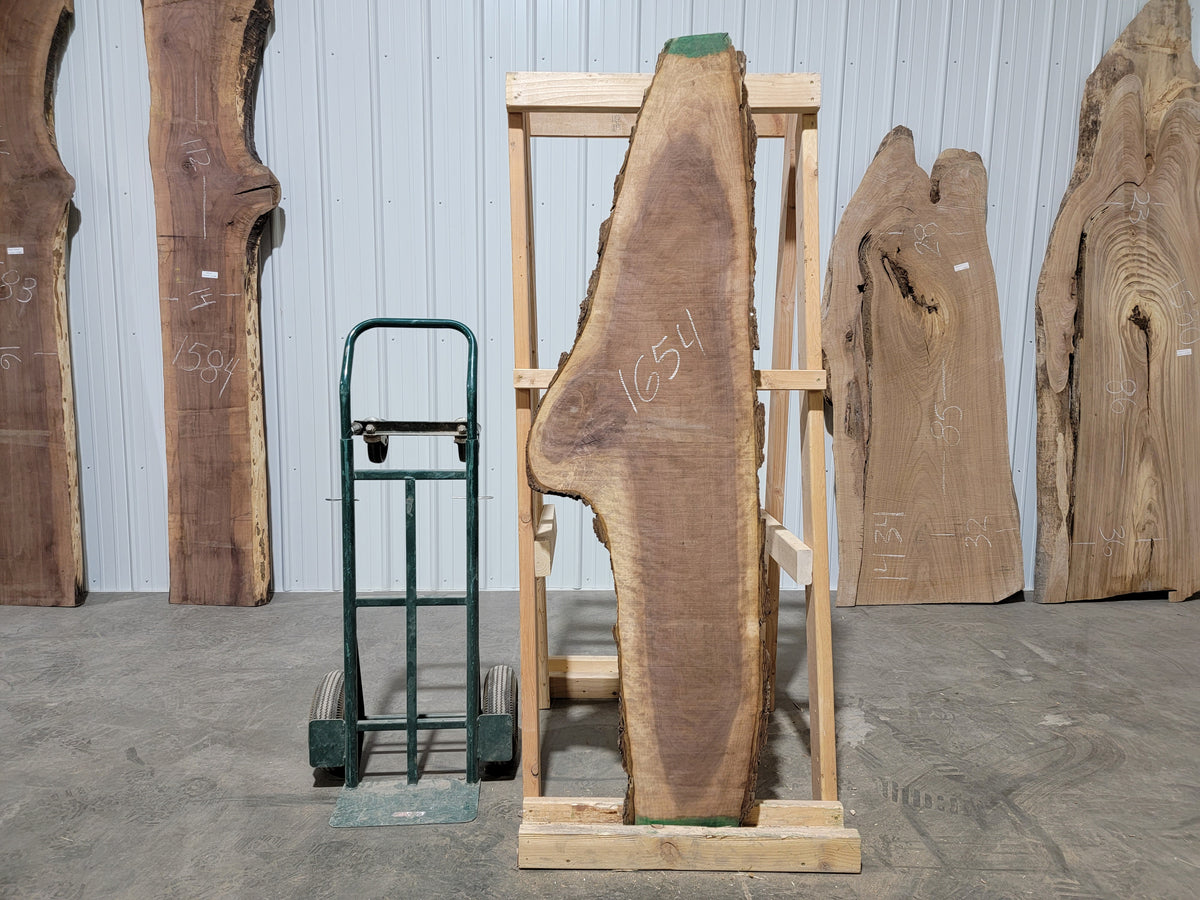 Black Walnut (1654) 63” L X 7-18” W X 2” T