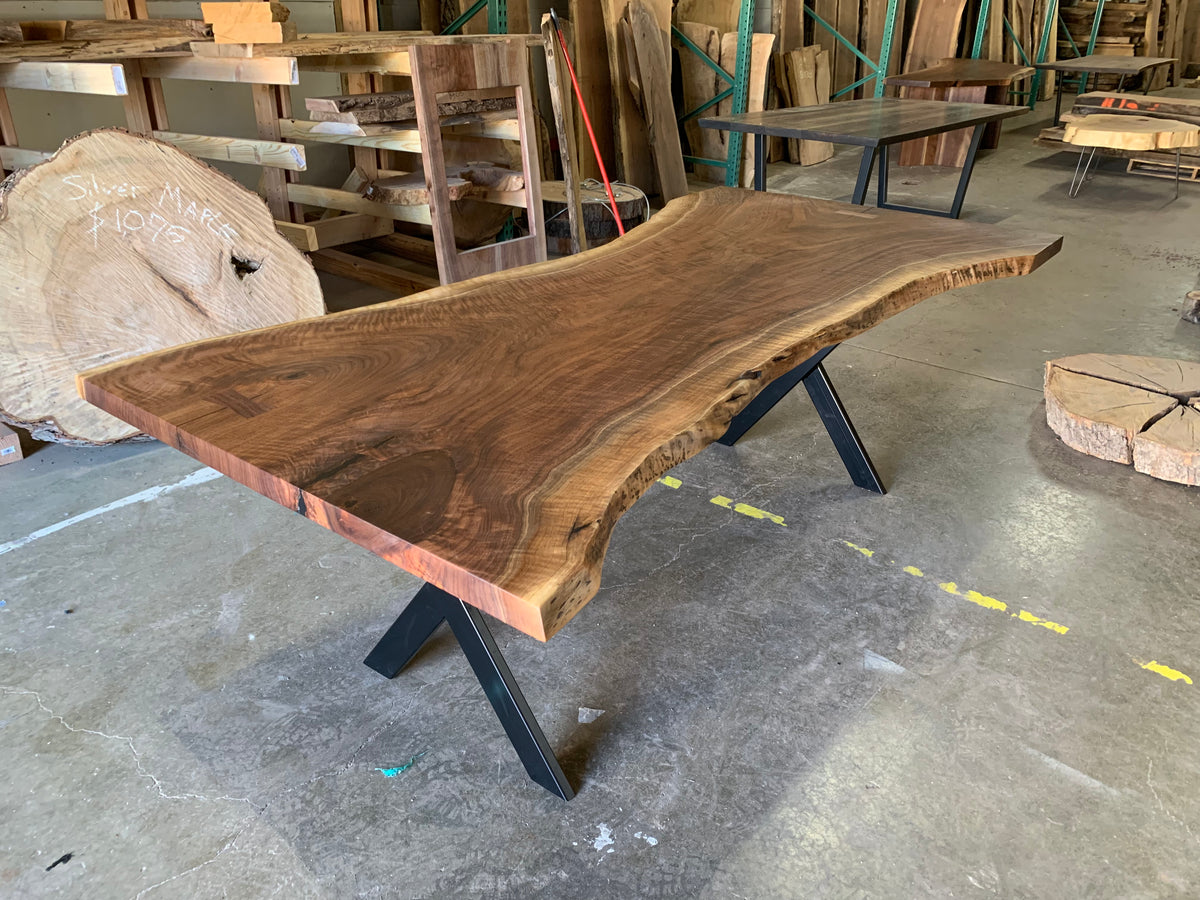 single slab black walnut dining table