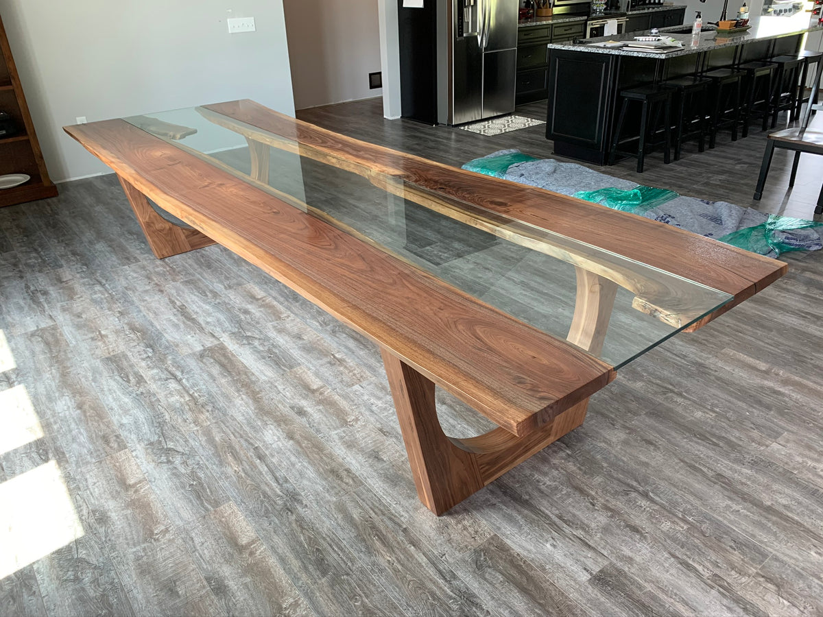 Black walnut glass river dining table on wood legs