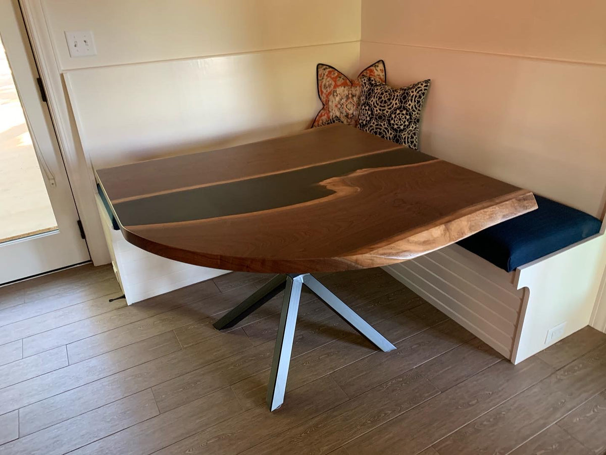 black walnut epoxy river dining table on steel base