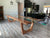 Black walnut glass river dining table on wood legs