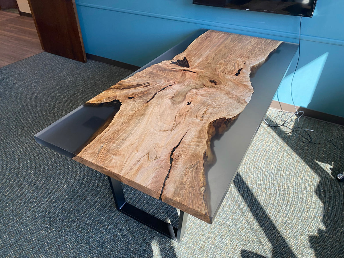 Epoxy casted maple conference table