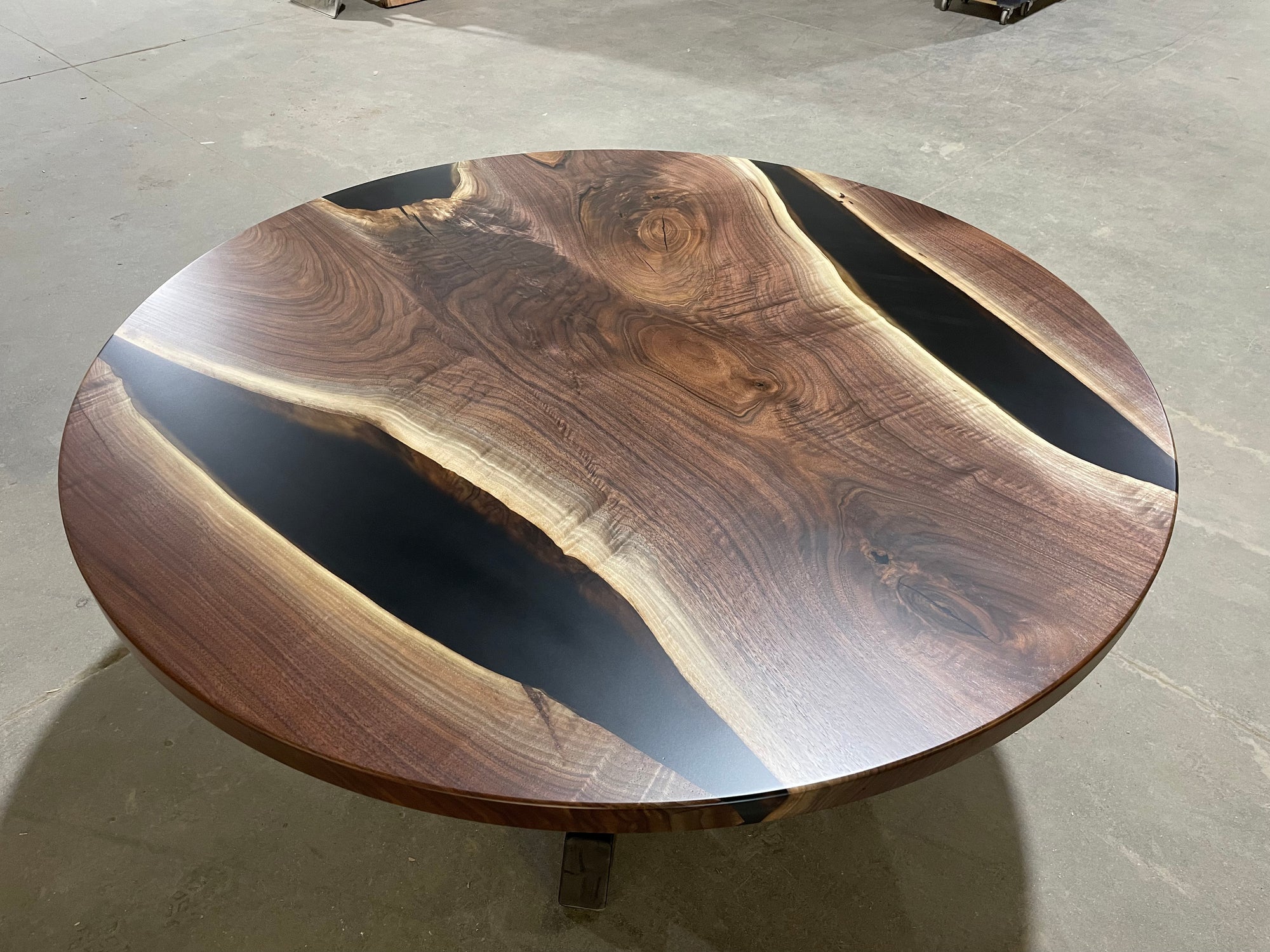 round black walnut epoxy river table