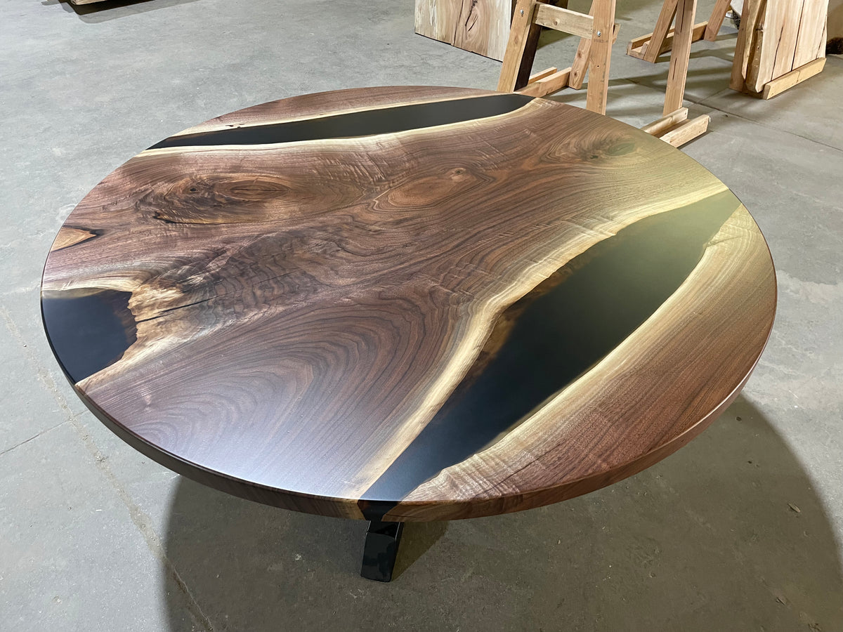 round black walnut epoxy river table